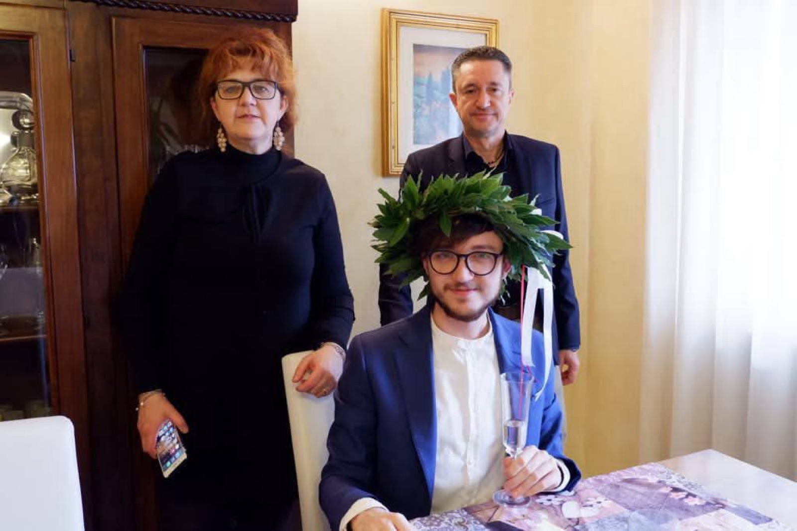 Famiglia con figlio laureato